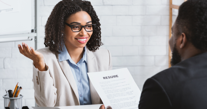 US recruitment manager conducting a remote interview with a job candidate
